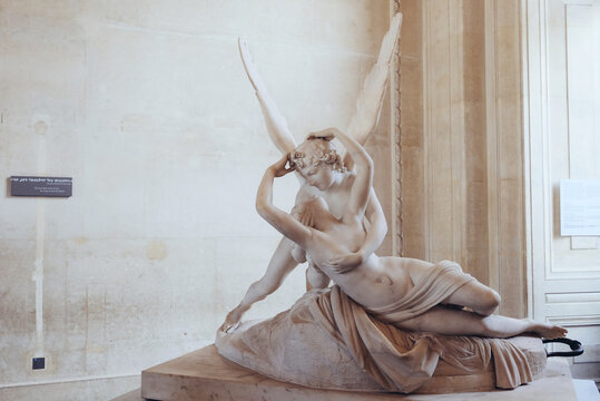 Paris, France - May 3, 2019: Psyche Revived by Cupid's Kiss, sculpture by Italian artist Antonio Canova exposed at the Louvre Museum.