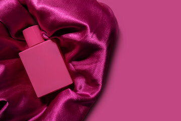 Rose perfume on pink silk, satin cosmetic essence, romantic aroma, luxurious care
