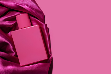 Rose perfume on pink silk, chic spray bottle, sensual fragrance, trendy packaging
