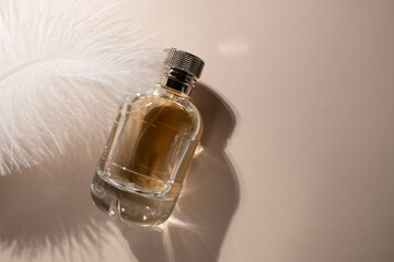 Gold perfume on the podium with soft feather, essential liquid essence, delicate fragrance, purity...