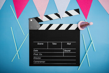 Clapper board and birthday decorations, action scene, movie production, screen clap