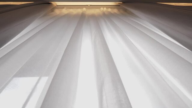 the curtains on the electric motor or electric curtain rod are opened