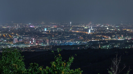 Obraz premium Skyline of Vienna from Danube Viewpoint Leopoldsberg aerial night timelapse.