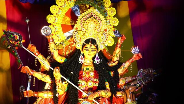 an illuminated sculpture of goddess durga
