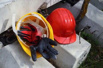  yellow and red helmets on a work site
