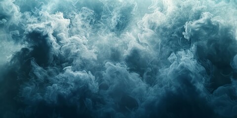 Fototapeta premium Blue cloud of smoke on a dark background. Design element. Abstract texture