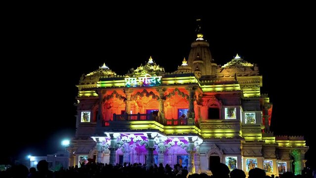 silhouette of tourists in prem mandir night view
