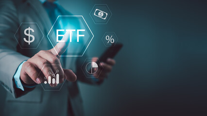 Businessmen use your fingers touch icons of ETF Exchange traded fund stock market trading investment financial concept, Investment Opportunities in Mutual Funds and ETFs.