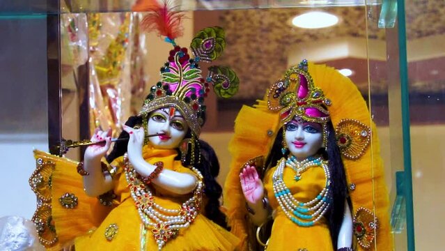 cute sculpture of god krishna and radha