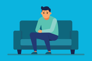 a frustrated man sitting on the couch at night.