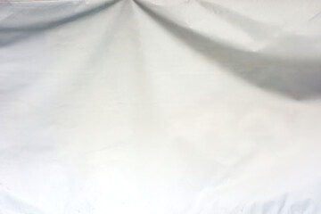 White cloth background abstract with soft waves