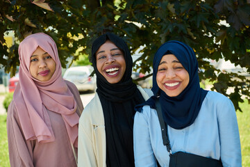 Sisterhood Snapshot: Middle Eastern Muslim Women in Hijab Capturing Unity