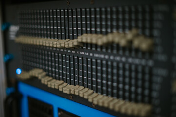 An audio mixer with its knobs and sliders meticulously adjusted, embodying precision and control in...