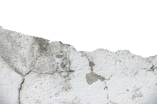 The old cement wall is broken, cracked, and damaged isolated on white background.