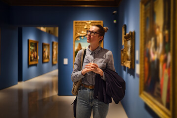 women in the museum looks at art exhibitions gallery