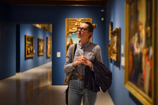 women in the museum looks at art exhibitions gallery