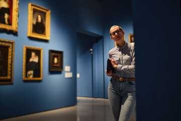 Women in the museum looks at art exhibitions