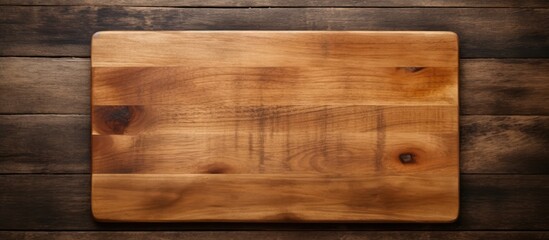 Obraz premium Copy space image featuring a wooden cutting board placed on a natural wooden background