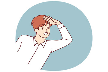 Boy looks out and puts hand to forehead to look into distance and find interesting offer or close person. Positive teenage boy smiling and playing spy or detective watching friends