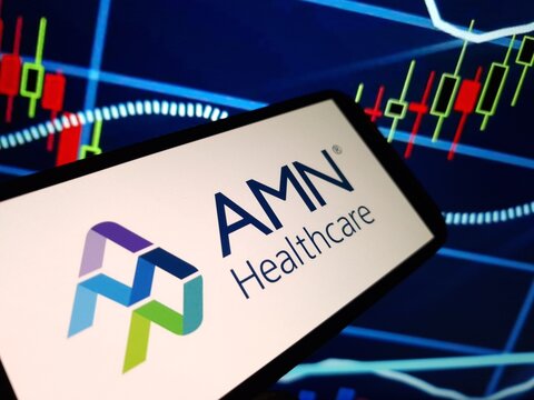 Konskie, Poland - May 12, 2024: AMN Healthcare Services company logo displayed on mobile phone
