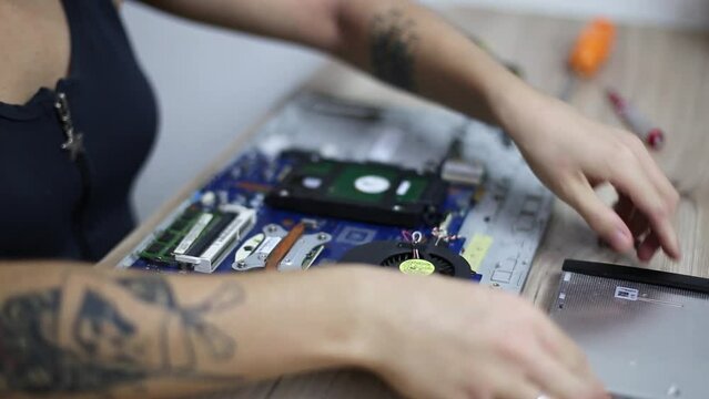 Woman taking out hardware parts