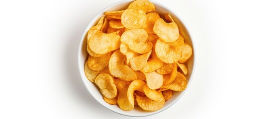 Top view picture showing a bowl filled with a mixture of crisps on a white background providing ample copy space