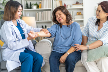 Female healthcare professional providing at home medical care to elderly woman with smile, senior patient, nursing, listens attentively to nurse, elderly care, home health services, patient at home