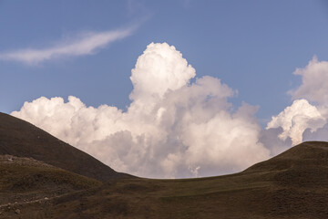 Beautiful clouds coming out of the mountains. Guba region. Azerbaijan.