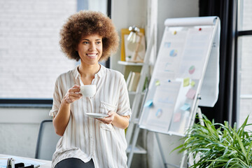 African american woman sips coffee, immersed in a moment of tranquility.