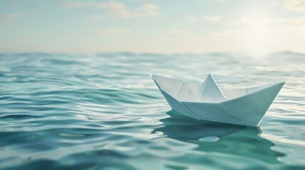 Obraz premium Paper boat floating on clear blue water