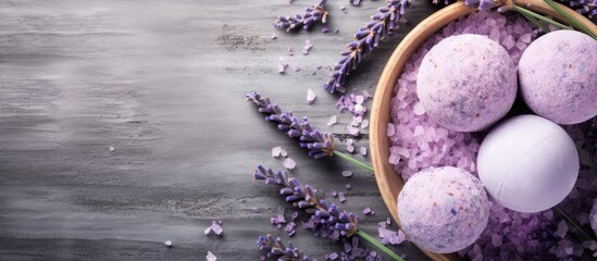 A top view of lavender bath bombs and sea salt with natural healthy ingredients fragrant spa...