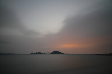 sunset on the beach. Seaside town of Turgutreis and spectacular sunsets. Selective Focus. Long Exposure shoot. tranquility scene.