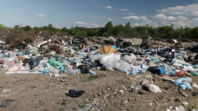 Overwhelming landscape, Problems urbanization, Garbage crisis. Heaps refuse dominate landscape, revealing troubling picture environmental carelessness and immediate call for better waste handling.