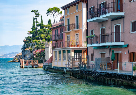 Lake Garda (Lago di Garda) and Italian Alps view from the Malcesine village. Italy, Veneto and Lombardy, southern Europe.