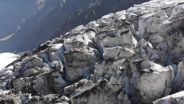 Caucasus, North Ossetia. Genaldon gorge. Cracks and seracs on the Maili glacier.