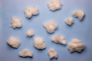 Cotton clouds on a sky blue background, business concept