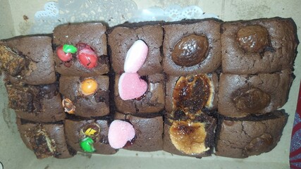Brownie cake with various toppings