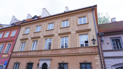 Rows of old colorful historic houses at old town market square, warsaw, poland