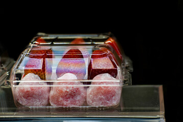 Japan, April 2024 : Japanese sweet-strawberry daifuku for sale in a shop at Nakamise Dori in Sensoji shrine. Sensoji temple at Japan.