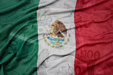waving colorful national flag of mexico on a euro money banknotes background. finance concept.