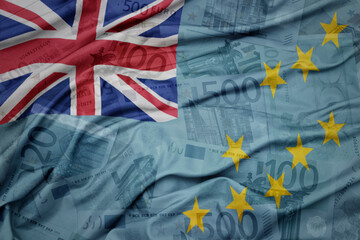 waving colorful national flag of Tuvalu on a euro money banknotes background. finance concept.