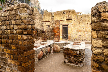 The ancient thermopolium snack bar in the ancient city of Herculaneum, destroyed by Mount Vesuvius