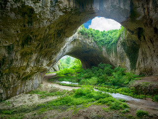 View inside the Devetashka Cave near Devetaki village and Osam river in Lovech, Bulgaria. Natural...