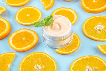 Orange citrus Vitamin C face care - cream, serum. mask, face cleaner, antioxidant moisturizer skin face care and make up concept, with fresh orange fruit slices