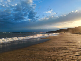 Beautiful sunset from a Mediterranean beach in Spain at the beginning of spring photographed from...