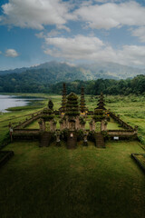 Aerial view of hindu temple ruins of Pura Hulun Danu at the Tamblingan lake, Bali, Indonesia