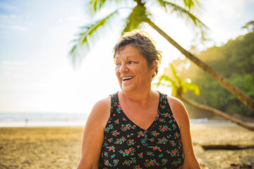 Senior woman having great time on Costa rica beach