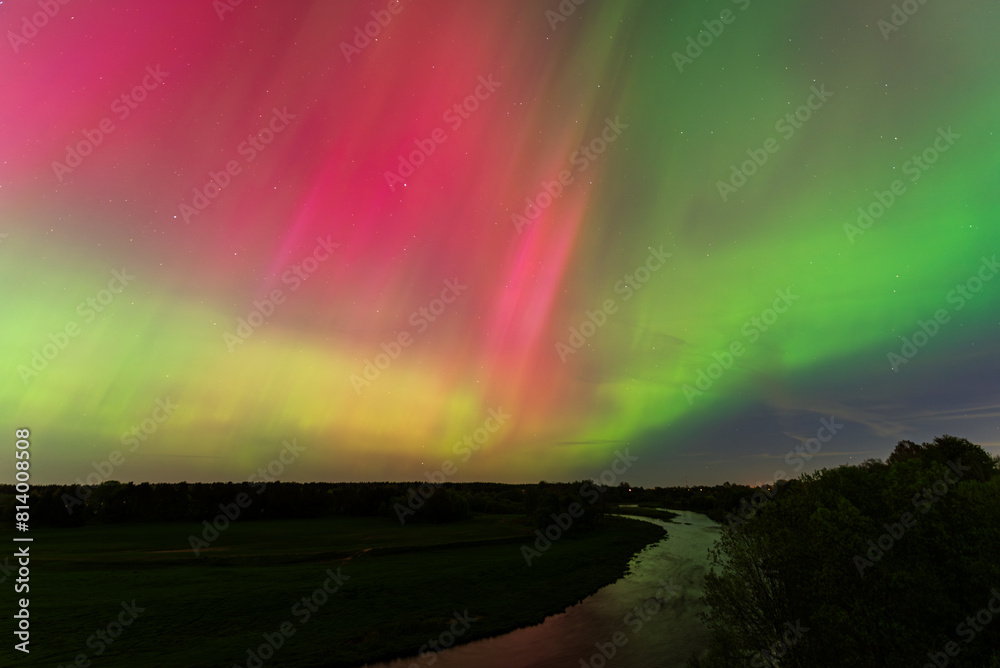 Wall mural aurora borealis, the northern lights at kuldiga, latvia.