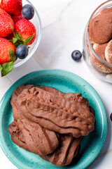 Chocolate shortbread cookies. Light background