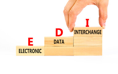 EDI electronic data interchange symbol. Concept words EDI electronic data interchange on blocks. Beautiful white background. Business and EDI electronic data interchange concept. Copy space.